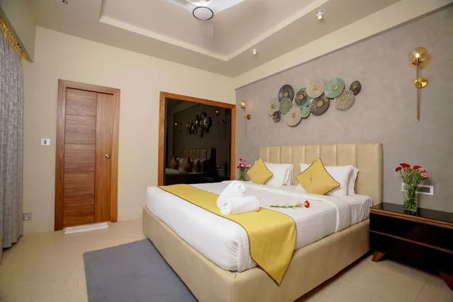 جناح بريميير بسريرين كينج بغرفتي نوم، Lazdana Hotel Bangalore 2/4