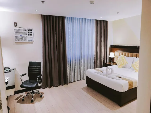 غرفة ديلوكس بسرير كوين، The VIP Hotel Cagayan De Oro 1/7