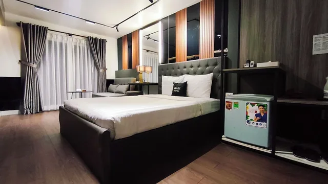 جناح بسرير كوين وسرير فردي بشرفة، Moc Huong Hotel 3/10
