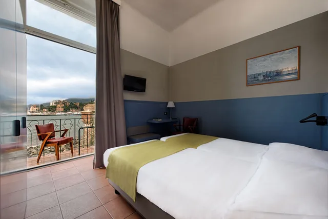 غرفة كلاسيكية بسريرين منفصلين بإطلالة على البحر، Hotel Italia e Lido Rapallo 1/10