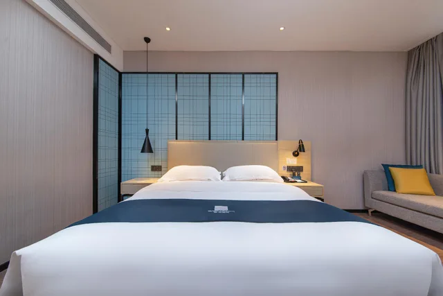 جناح ديلوكس بسرير كينج، Echarm Hotel Huaihua Hexi Longping Guoji 1/1