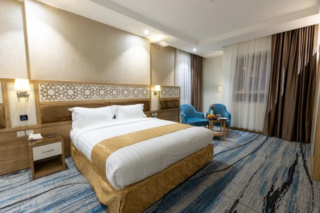 غرفة ديلوكس بسرير كينج، فندق وأجنحة تايم ربا(TIME Ruba Hotel & Suites) 1/6