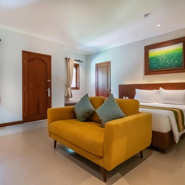 غرفة ديلوكس بسرير مزدوج أو سريرين منفصلين مع سرير إضافي، Adi Dharma Hotel Legian 1/2