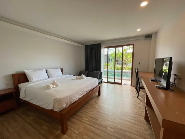 غرفة ديلوكس بسرير كوين بإطلالة على المسبح، Utopia Resort 1/1