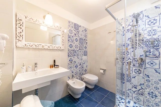 غرفة رومانسية رباعية بسرير كوين وسريرين منفصلين، Quattrocuori Room & Relax 1/2