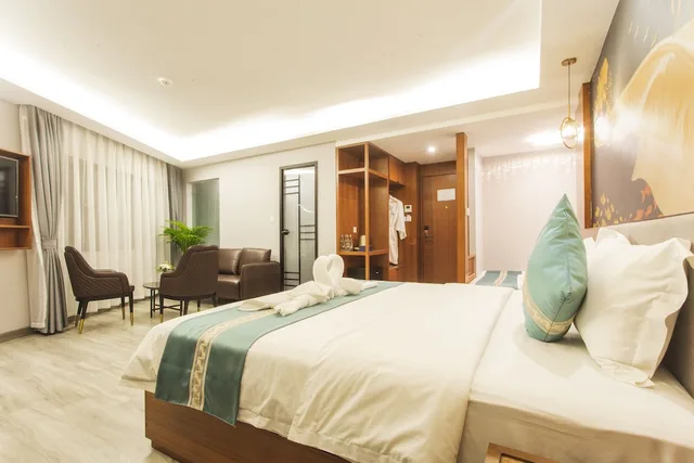 غرفة عائلية بسرير كينج وسرير كوين، Thapae Twins Hotel 2/7