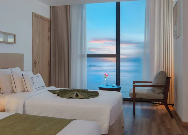 غرفة متصلة عائلية بسرير كينج وسريرين منفصلين بإطلالة على البحر، Starcity Bayfront Nha Trang Hotel 7/10