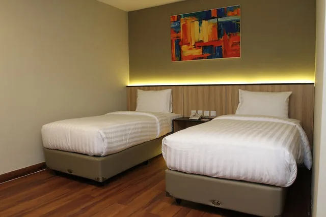 Standard, Twin Beds, No Window، Havana Mutiara Belitung 1/2
