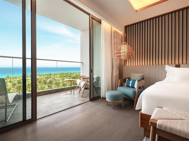 غرفة متصلة عائلية بسرير كينج وسريرين منفصلين بإطلالة على البحر، Radisson Blu Resort Cam Ranh 3/4