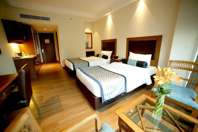 Premium, Double Bed, The Lalit Traveller 1/1