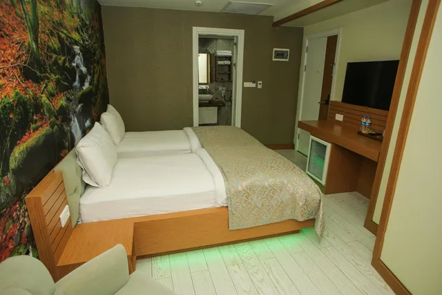 غرفة بسرير مزدوج أو سريرين منفصلين بإطلالة على الحديقة، Quantum Hotel 1/10