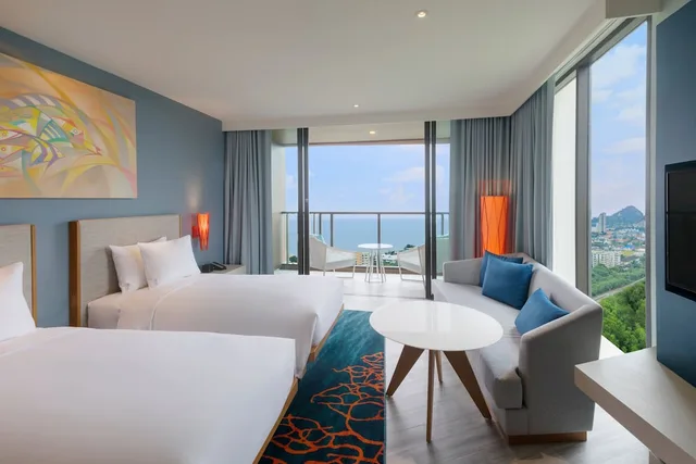 غرفة قياسية بسريرين منفصلين بإطلالة على البحر في طابق مرتفع، Holiday Inn Vana Nava Hua Hin 2/6