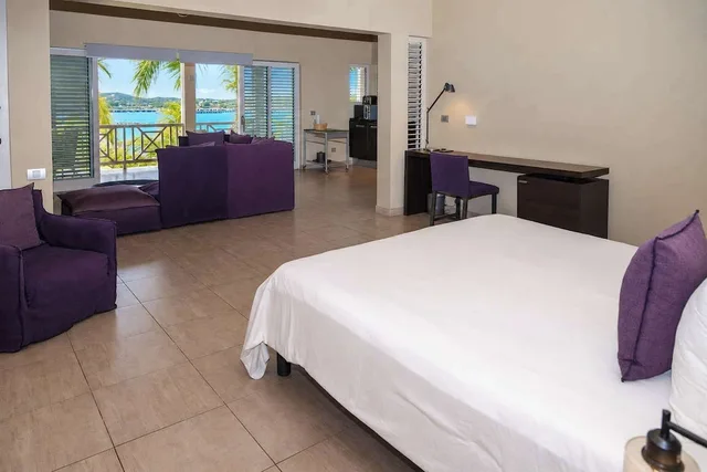 جناح ديلوكس بإطلالة على المرسى بشرفة بغرفة نوم واحدة، South Point Antigua 1/4