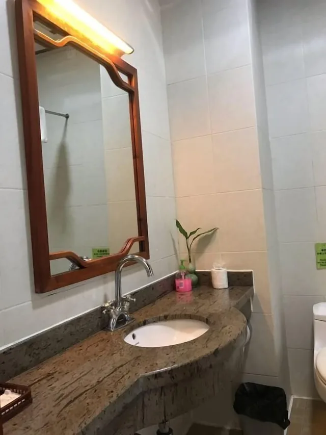 غرفة رباعية بسرير كوين وسريرين منفصلين، Snow Lion Riverside Resort 10/10