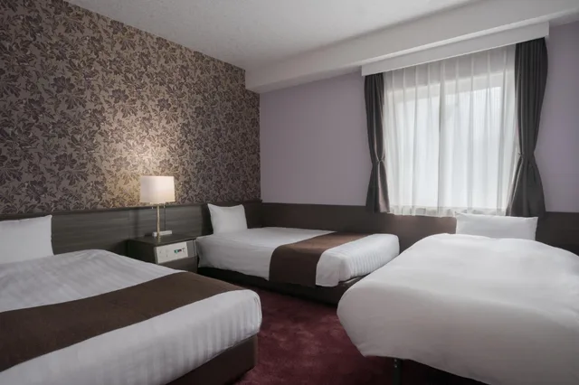 غرفة ديلوكس بثلاثة أسرّة مع سرير إضافي، Hotel Centmain Nagoya 1/1