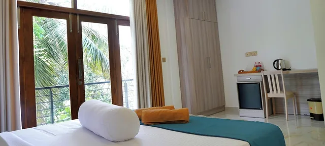 غرفة بريميير بسرير كينج، Nine Arch Holiday Resort 4/10
