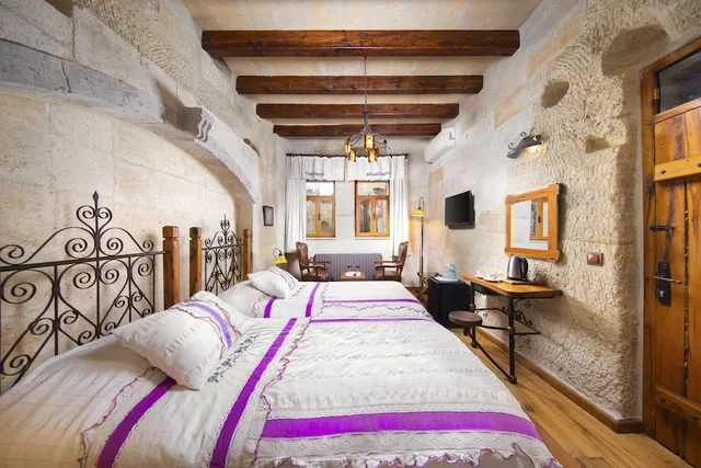 Stone, Twin Beds, Terra Cave Hotel 1/6
