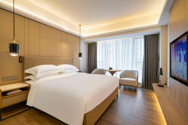 غرفة ديلوكس بسرير كينج وسرير كوين، Hongfeng Hotel 2/2