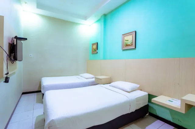 غرفة قياسية بسريرين منفصلين، Ardhya Guest House 7/9