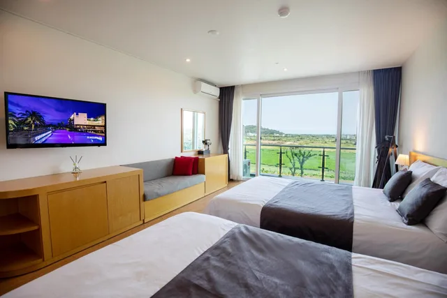 غرفة سوبيريور بسريرين منفصلين بإطلالة على الحديقة، The Four Graces Resort 6/7