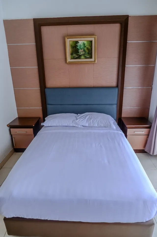 غرفة عائلية بسرير كوين، Hotel Hakmaz Taba Syariah Lubuk Linggau 3/6