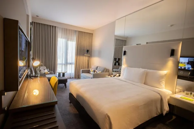 غرفة قياسية بسريرين منفصلين، Centro Mada Amman by Rotana 1/2