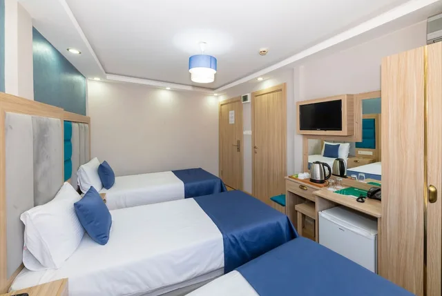 غرفة قياسية ثلاثية بثلاثة أسرّة بإطلالة على المدينة، Yesilpark Hotel 1/4