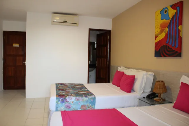 Sol, Family, Suite, 1 Queen and 3 Single Beds, Balcony، Pousada Encontro das Aguas 2/8
