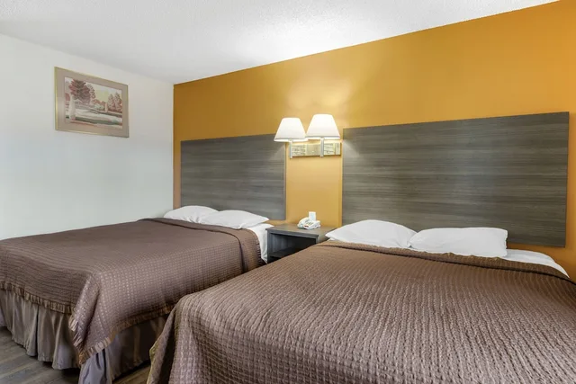 غرفة كلاسيكية بسريرين كوين، Riverside Inn & Suites 2/5