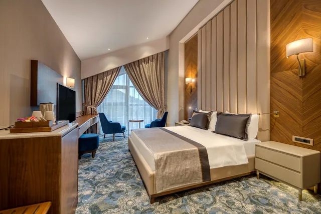 دوبلكس عائلي بسريرين منفصلين وسرير كينج بإطلالة على الحديقة مع أريكة، BN Hotel Thermal & SPA Mersin 1/7