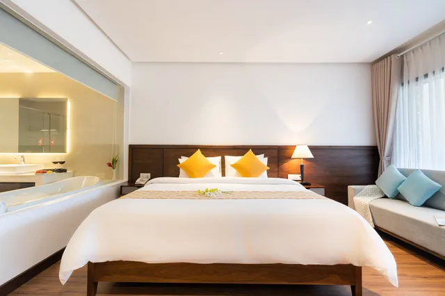 غرفة ديلوكس بسرير كينج بإطلالة على الحديقة، Hoang Ngoc Beach Resort 2/9