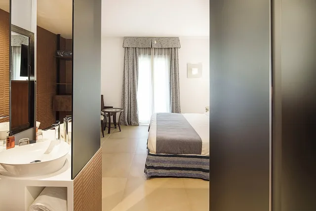 غرفة ديلوكس ثلاثية بسرير كينج، Alberi del Paradiso Hotel 10/10