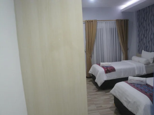 غرفة ديلوكس بسرير مزدوج أو سريرين منفصلين بإطلالة على البحر، Matahari Hotel 3/10