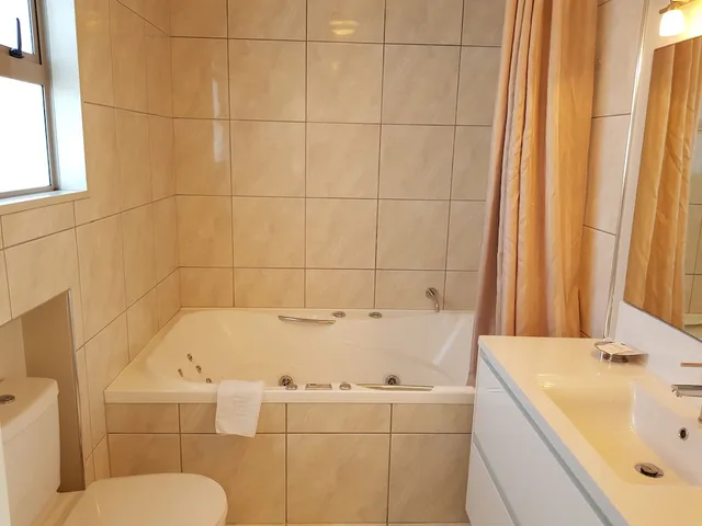 جناح تنفيذي بغرفة نوم واحدة بحوض جاكوزي، Delago Motel 6/10