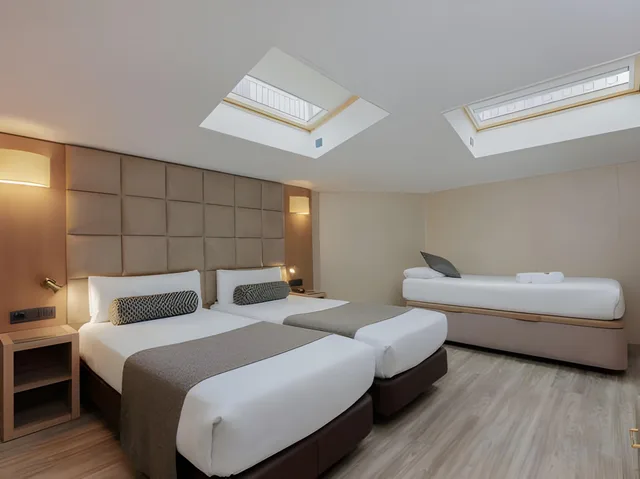 Room, Triple, 3 Beds, Attic، Hotel Suizo 1/1