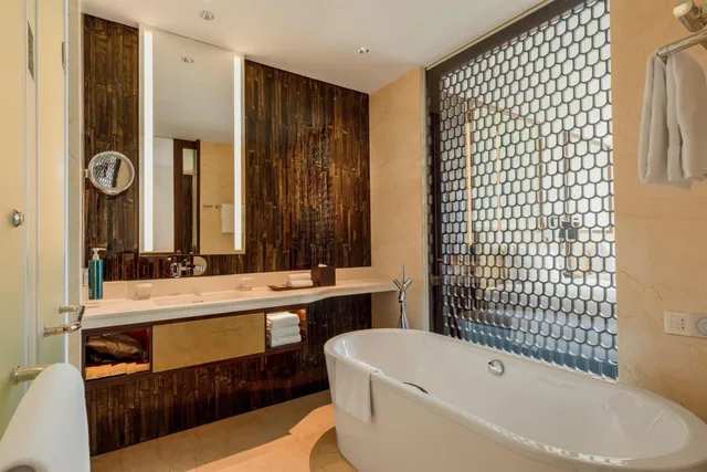 غرفة بسريرين كوين بإطلالة على النهر، Hilton Da Nang 5/7