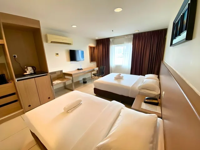 غرفة ثلاثية بسرير كينج وسرير فردي، Hotel Pudu Plaza 2/3