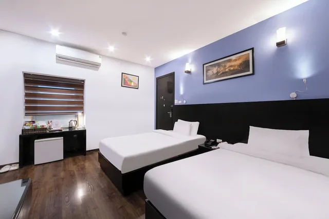 Deluxe, Suite, Triple, A25 Hotel - 15 Hang Than 1/9