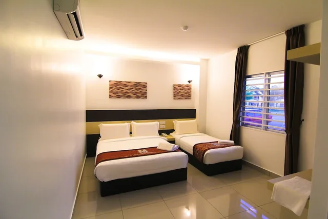 غرفة عائلية ثلاثية بسرير كوين وسرير فردي، Uptown Hotel Seremban 2/4