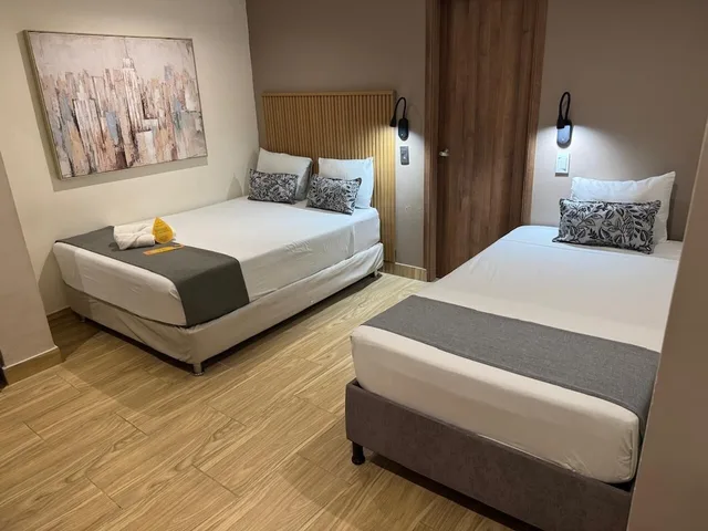 غرفة سوبيريور ثلاثية بسرير مزدوج وسرير فردي، Ayenda Casa Roman 3/6