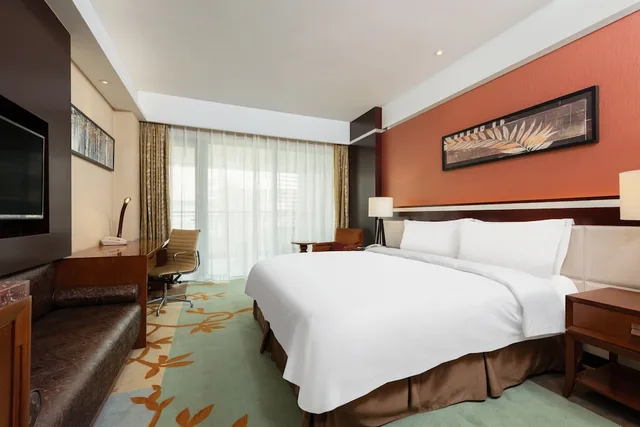 غرفة قياسية بسرير كينج بإطلالة على الحديقة، Holiday Inn Beijing Shijingshan Parkview 3/6