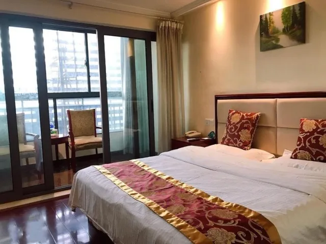 غرفة ديلوكس عائلية بسرير كينج وسرير فردي، Greentree Inn Suzhou Taiping Town High-Speed North Station Express Hotel 1/4