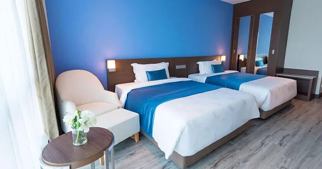 غرفة ديلوكس تنفيذية بسريرين منفصلين وسريرين مزدوجين بإطلالة على النهر، Riverside Majestic - Astana Wing 2/3