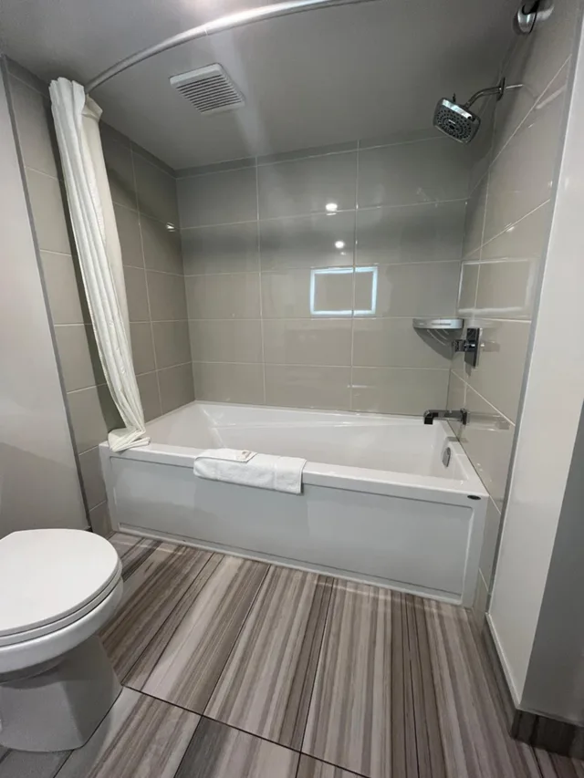 Pacific, Suite, 2 Queen Beds, Sofa, Kitchen, Super 8 by Wyndham Macleod Trail Calgary 2/3