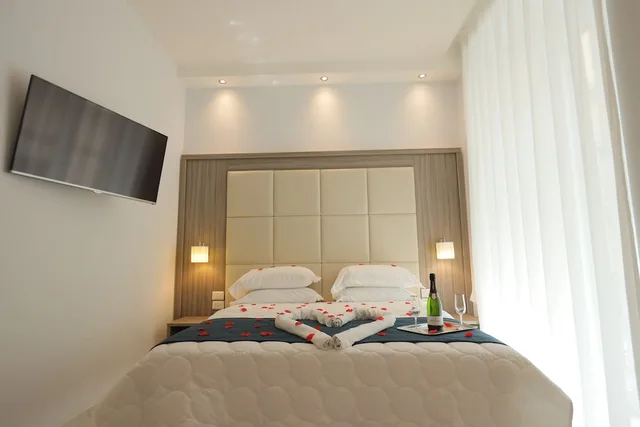 غرفة قياسية رباعية بسرير كوين وسريرين منفصلين، Garibaldi Suite 3/10