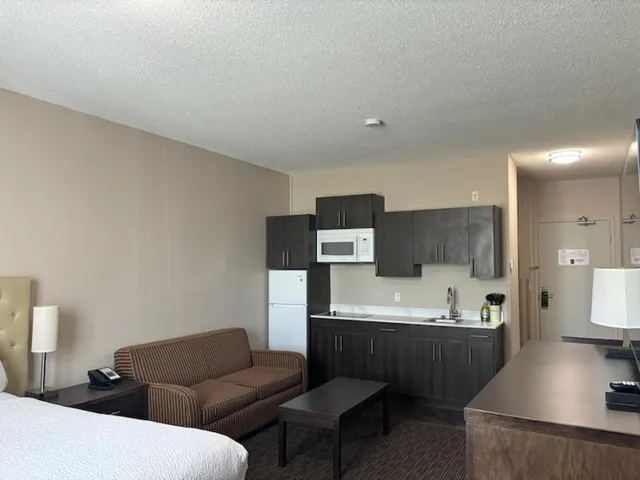Room, 2 Queen Beds, Sofa, Accessible, Ramada by Wyndham Estevan 2/3