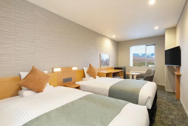 غرفة بسريرين منفصلين، Kusatsu Onsen Hotel Resort 2/4