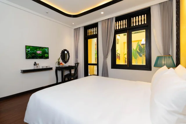 غرفة ديلوكس بسرير كينج بإطلالة على الحديقة، Lantern Boutique Hoi An 1/4