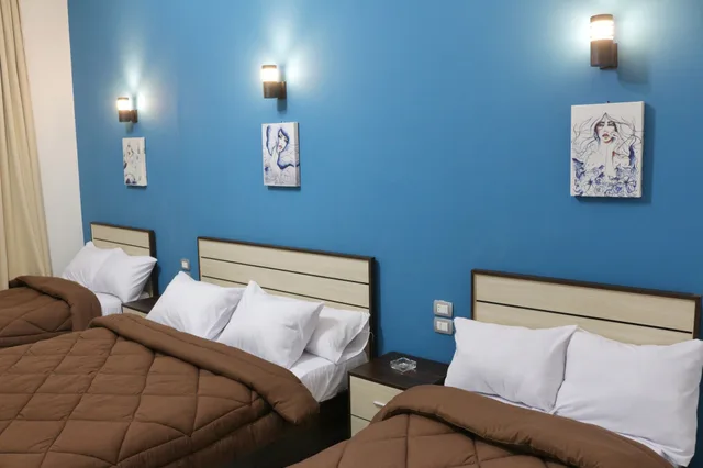غرفة ديلوكس رباعية بأربعة أسرّة بشرفة، Hostgram Hostel 1/10