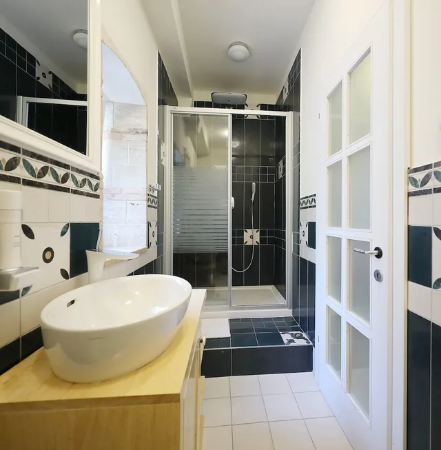 1 Bedroom, Design, Suite, Queen Bed, Sofa, Kitchen, Courtyard Area، Central Apartments - Integrated Hotel 3/4